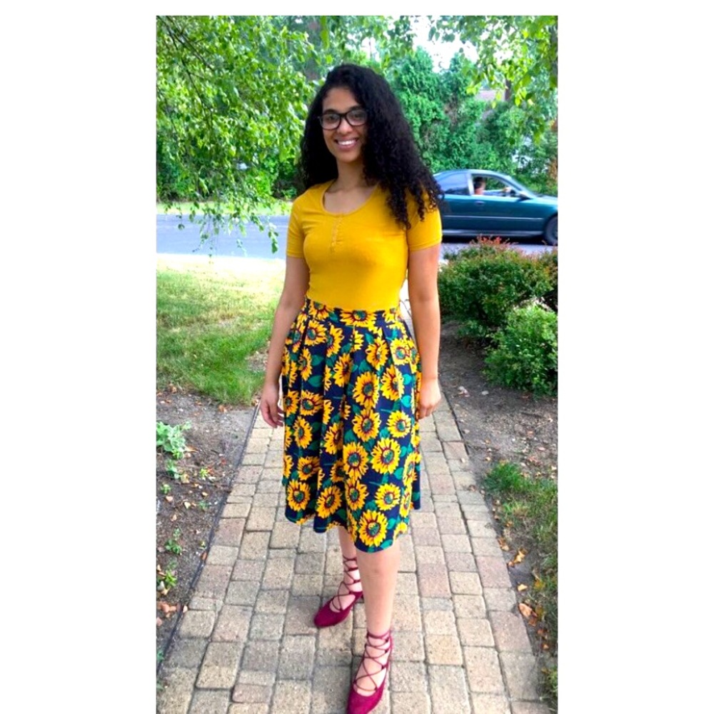 Skirt, sunflower designs, navy blue, yellow, dark green, with some burgundy. (L)